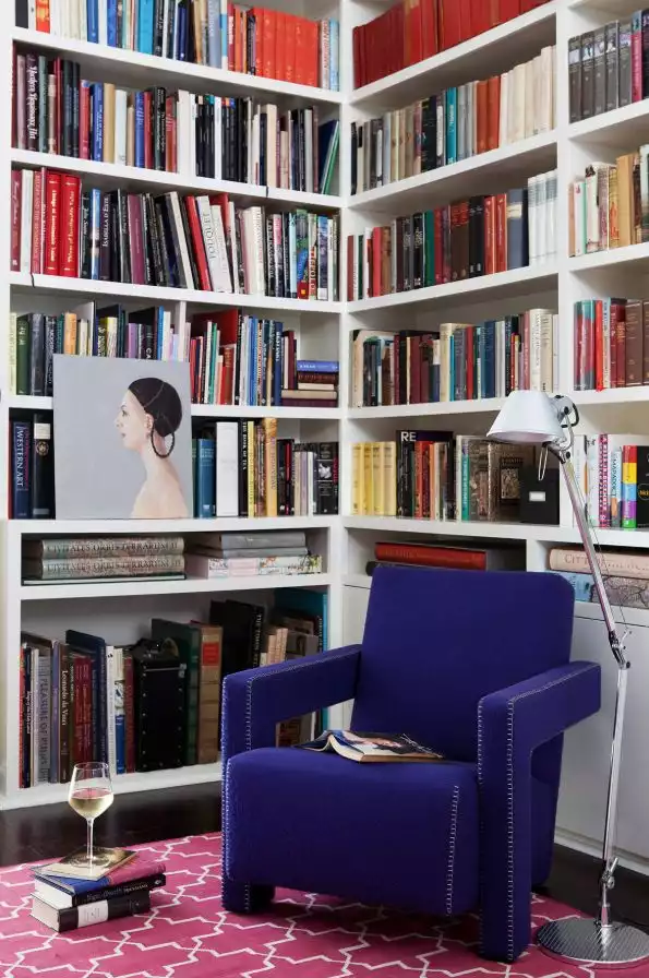 Blue reading chair in a library