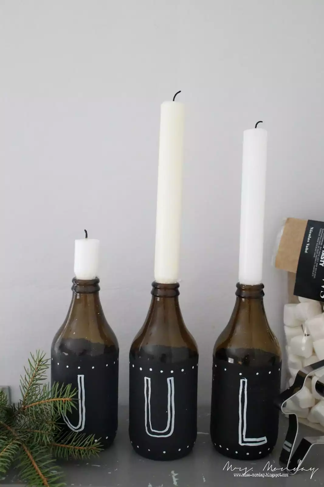 Chalk brown glass bottles used like candle holders