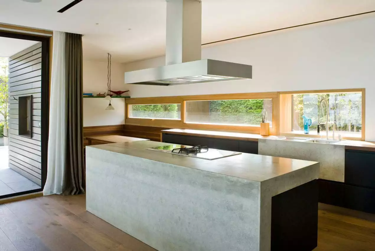 Concrete kitchen with waterfall countertop