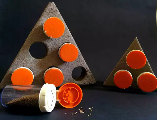 Concrete triangle spice rack