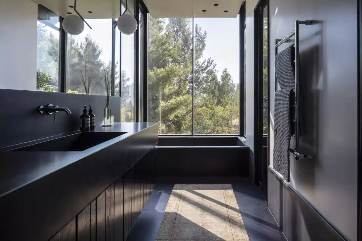 Contemporary Stone Cladding Villa by Dana Oberson Architects - bathroom