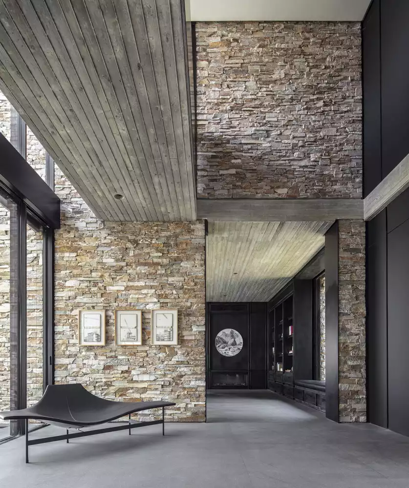 The entrance is a double-height space which leads into a foyer