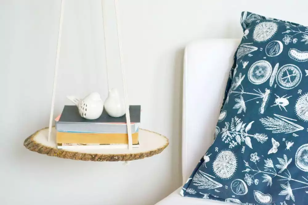 Wood slice shelf hanging from the ceiling 