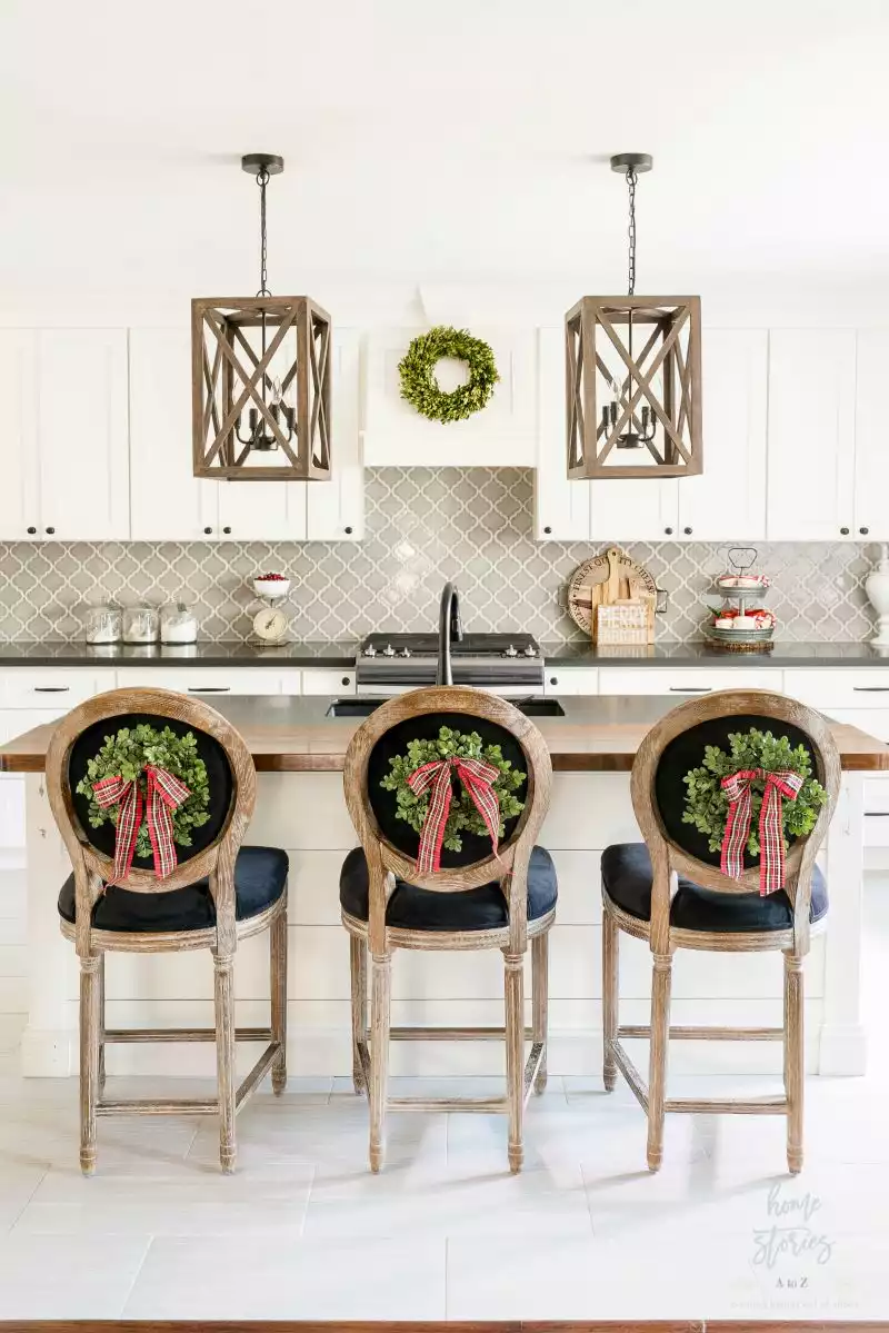 Decorating the back of the chairs with small wreaths