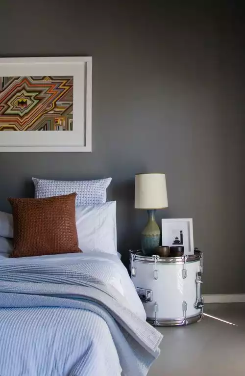 Old drum repurposed into a cool-looking nightstand 