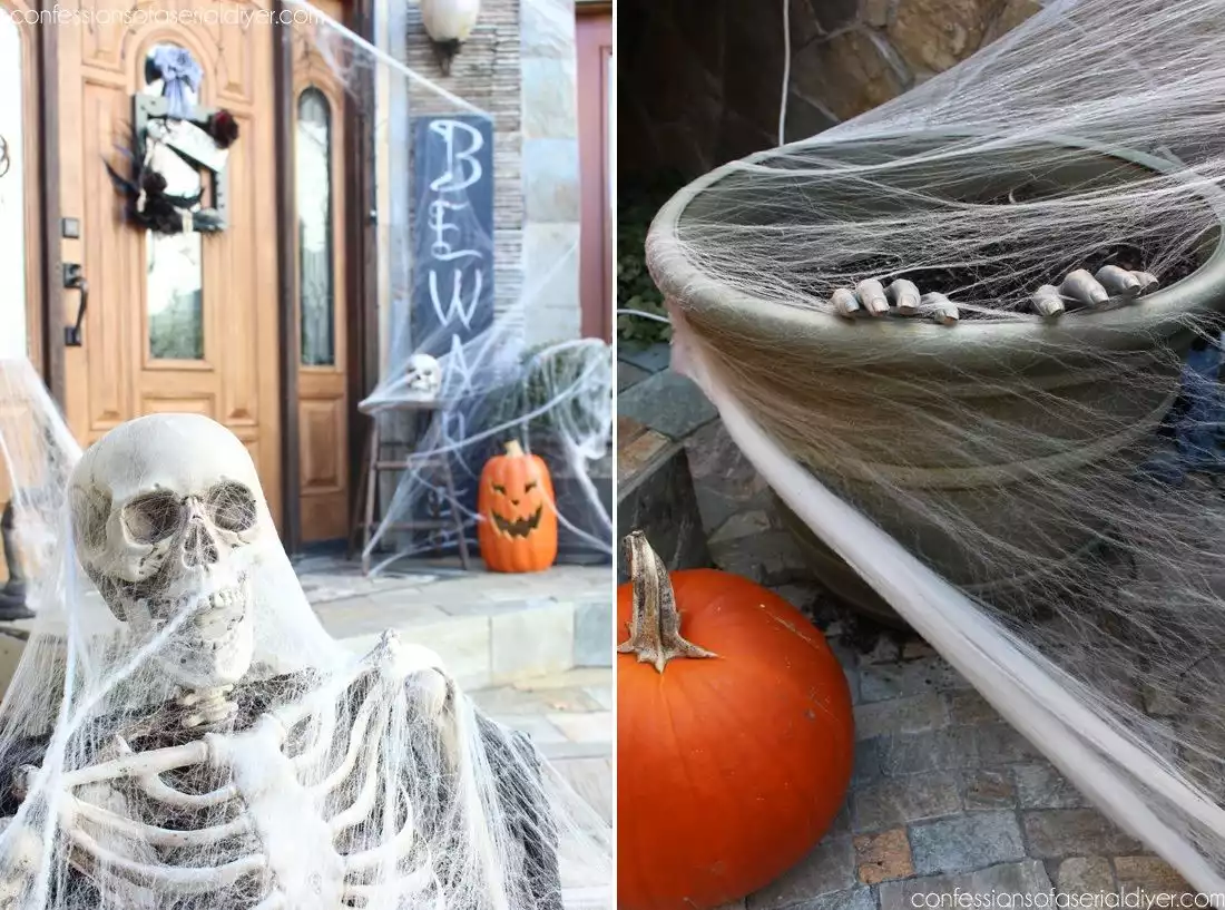 Front door decor for halloween with spider web