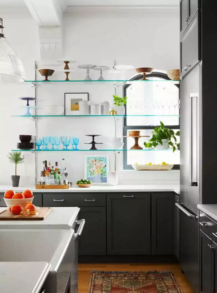 Glass Shelving with Dark Gray Kitchen Cabinets