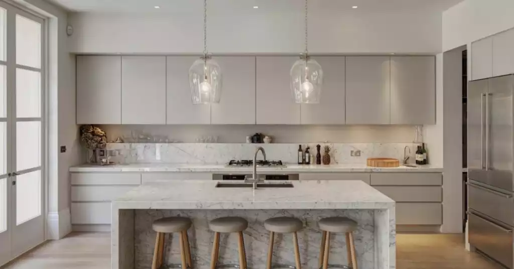 Gray Kitchen Cabinets and Glass Pendant Lighting