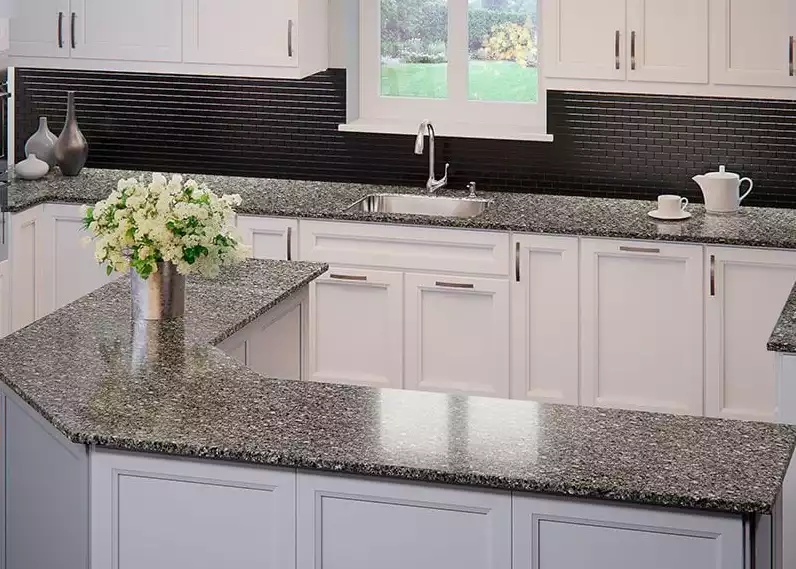 Gray Kitchen Cabinets with Black Backsplash