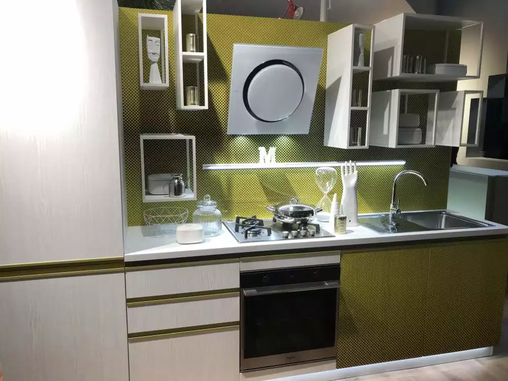 Green and warm gray kitchen cabinets