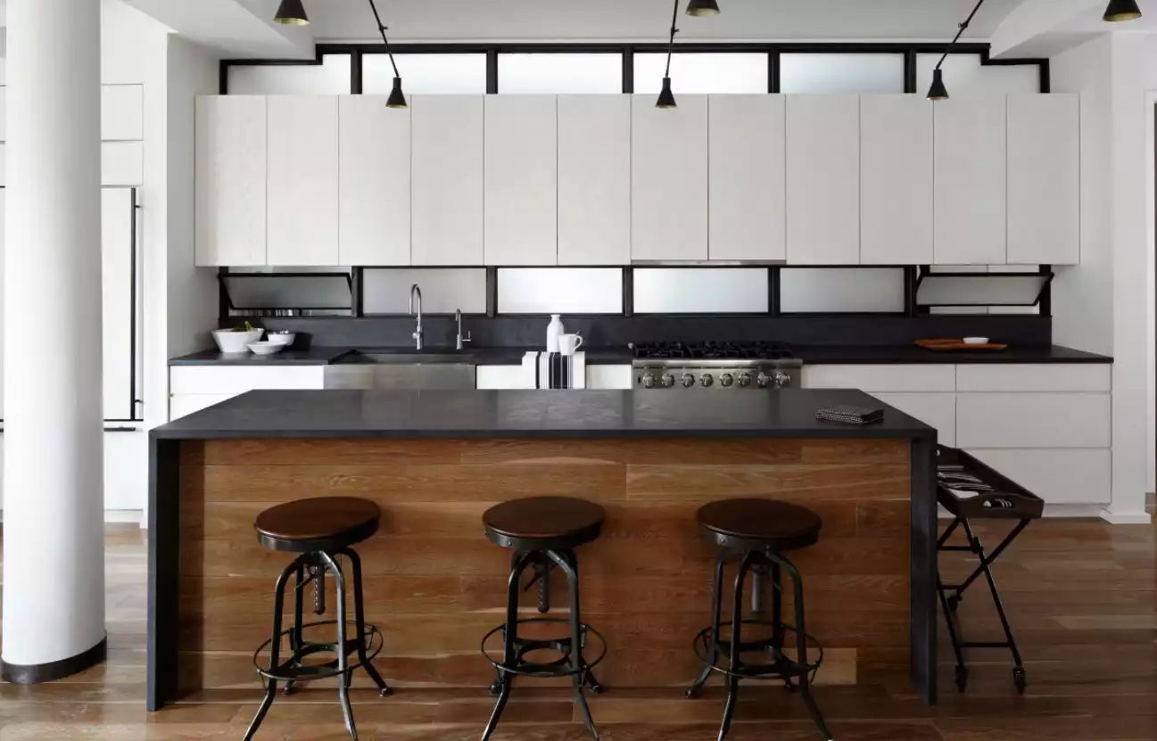 Industrial kitchen design with waterfall countertop