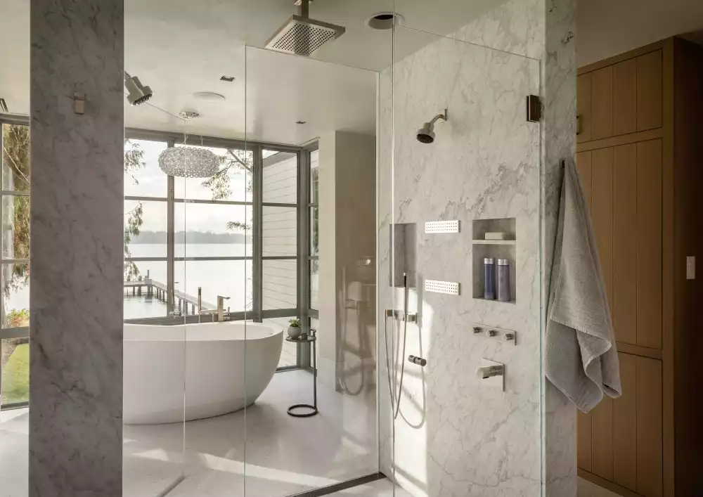 Luxury bathroom decor with shower niche and views