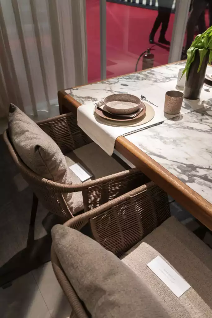 Marble top dining room table with wood trim 683x1024