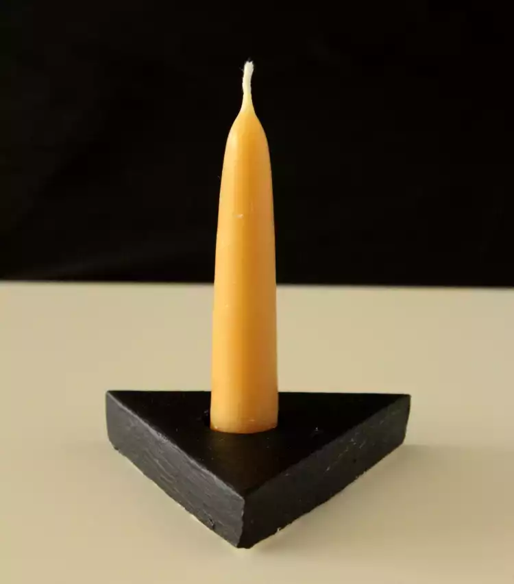 Masculine candle support