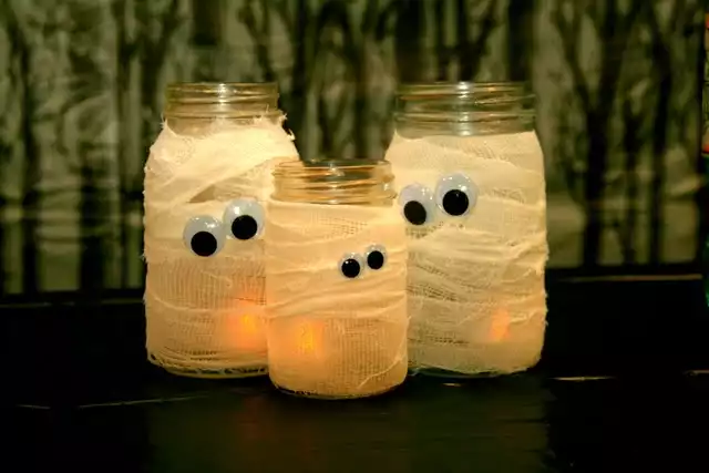 Mason jar into a mummy for Halloween