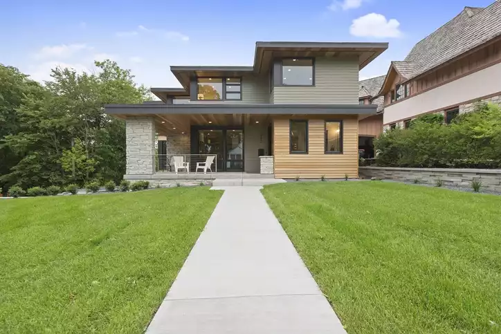 Modern house with green front yard