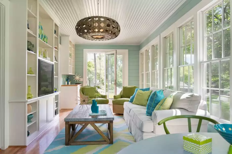 Modern then a colorful and invinting sun room