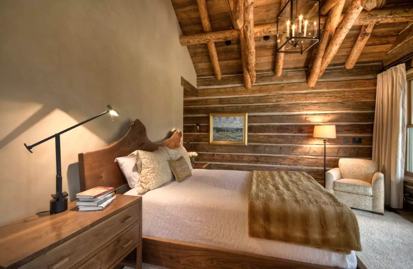 Mountain cabin bedroom decor with a live edge headboard