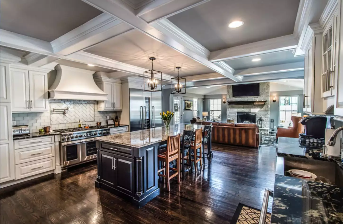 Open space living room with coffered ceiling