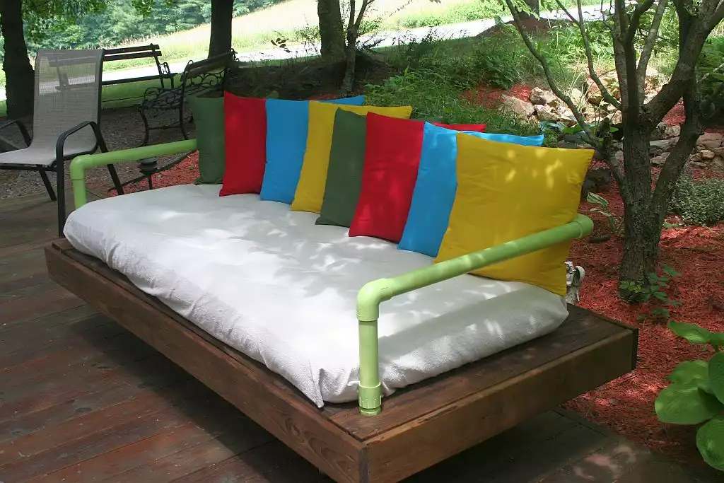 Palled bed couch with big pipes handles