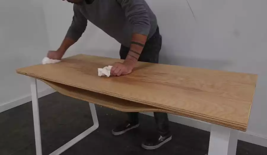 Plywood desk with a curved shelf