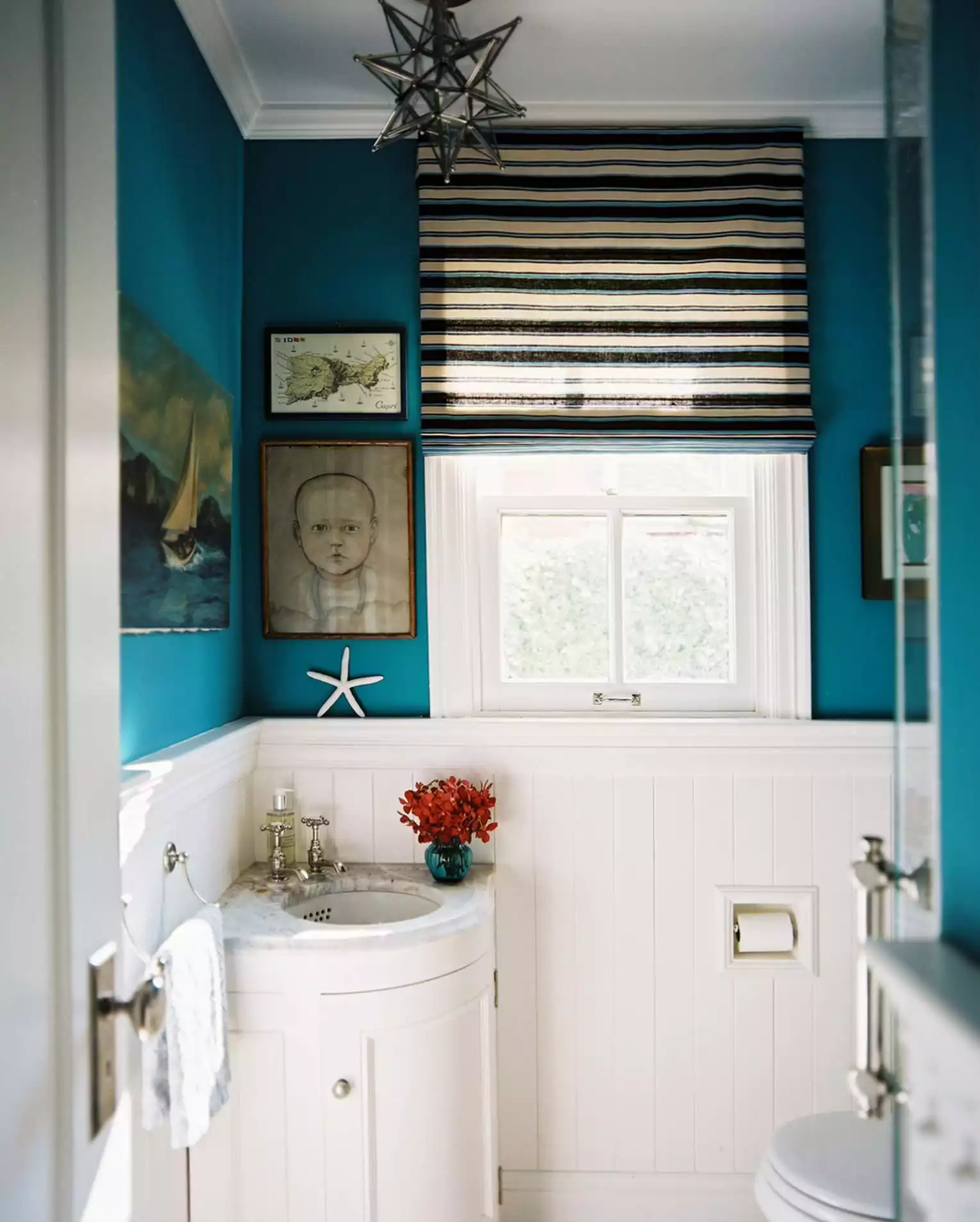 Powder room marbled corner vanity