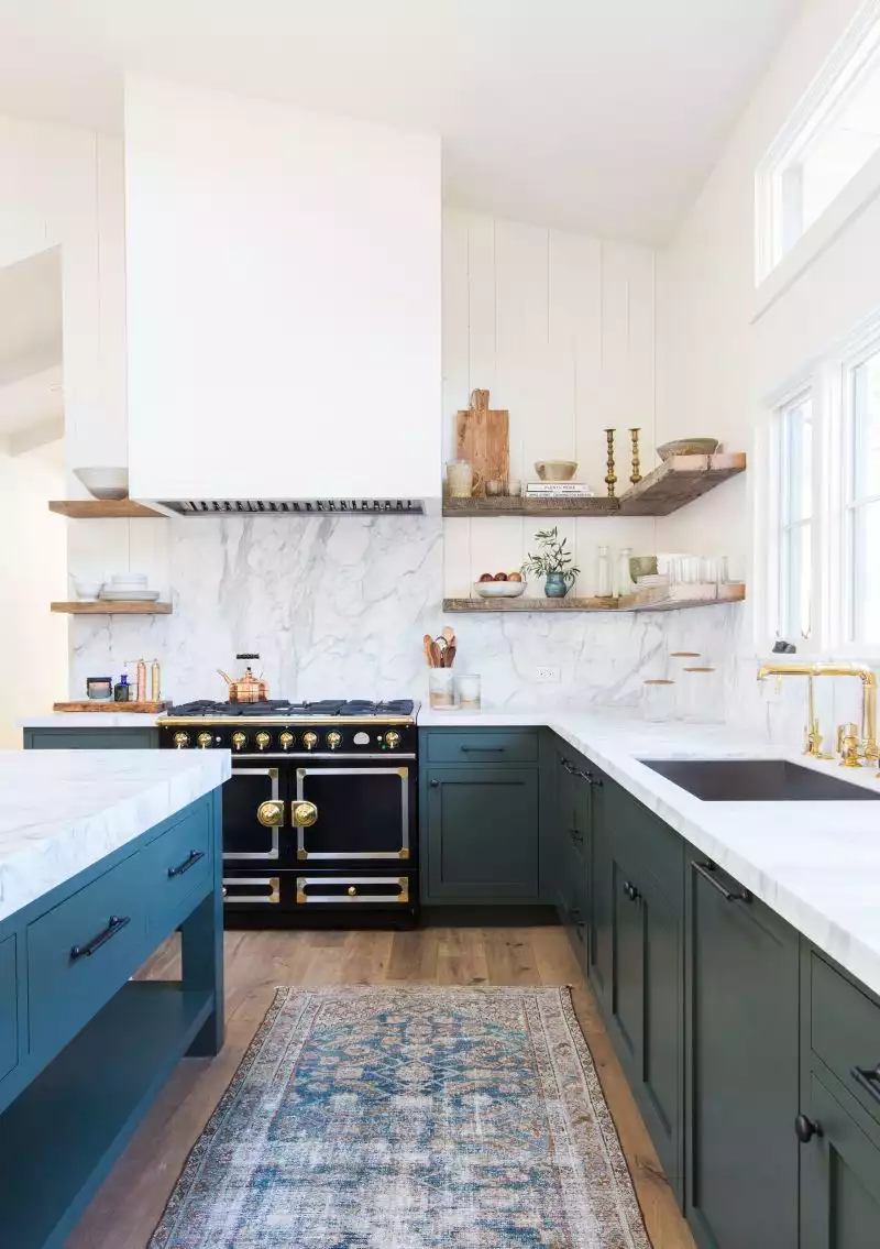 Pair wooden shelves with a marble backsplash