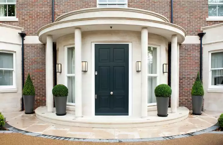 Round entryway with black door