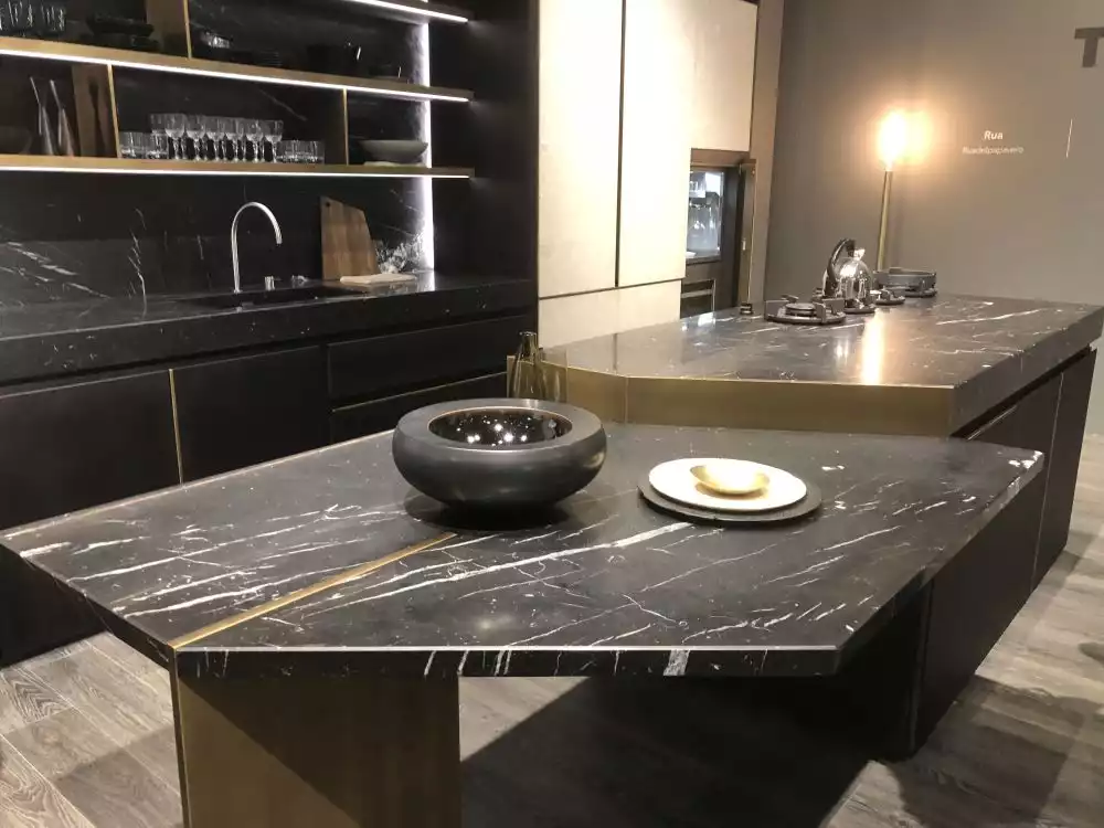 Rua black finish marble kitchen island with seating and stove