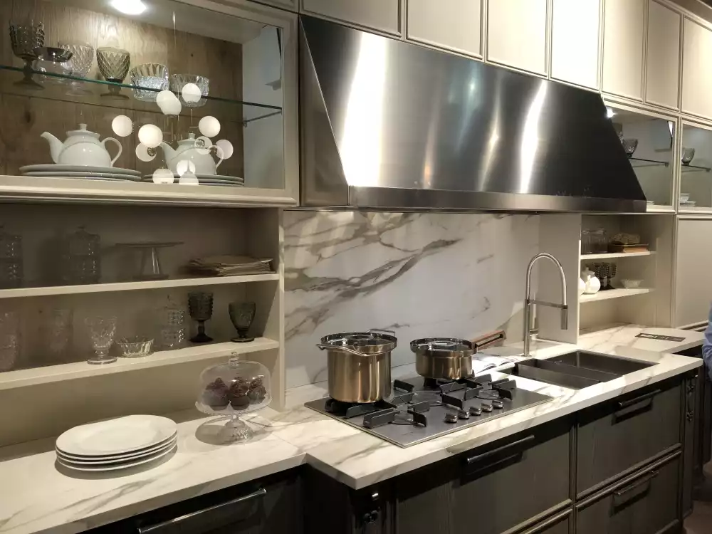 Shelves made from marble plus large kitchen vent