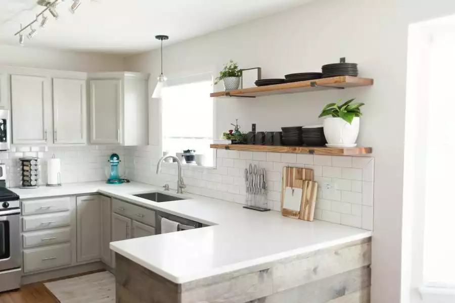 Sleek shelves above the backsplash