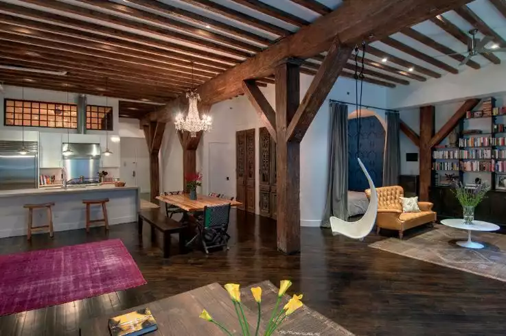 Solid wood beams used to hang chairs