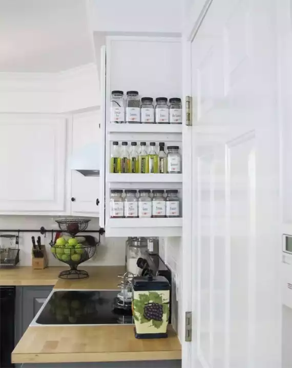 Spice rack on kitchen cupboard