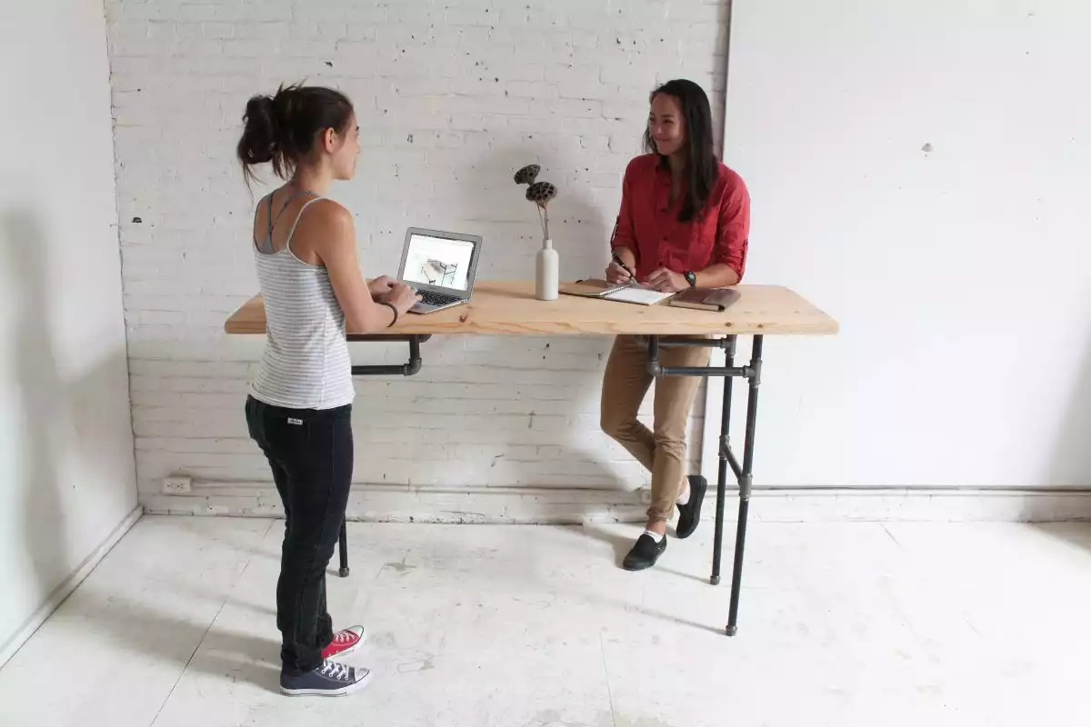 Standing desk with pipes