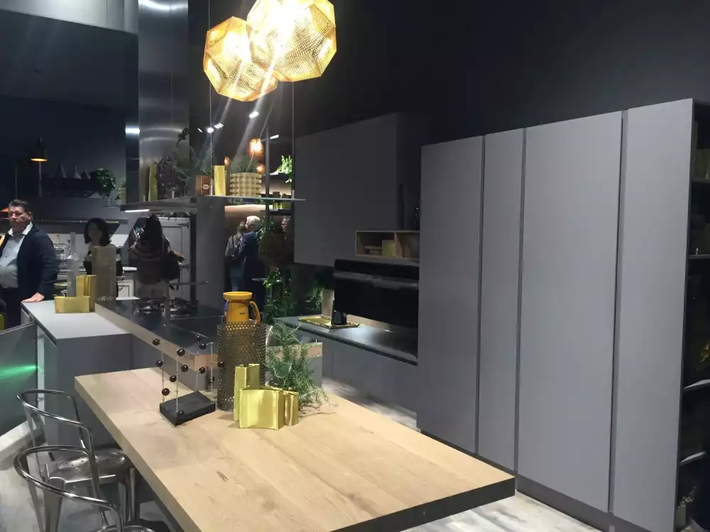 Standing kitchen cabinets and modern Tom dixon lights