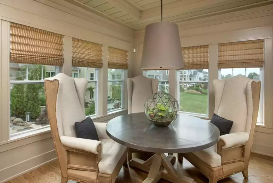 Sunroom round dining table with a top terrarium globe