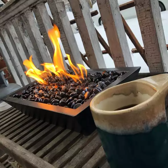 With a Tabletop Patio Heater You’ll Never Want to Come Inside