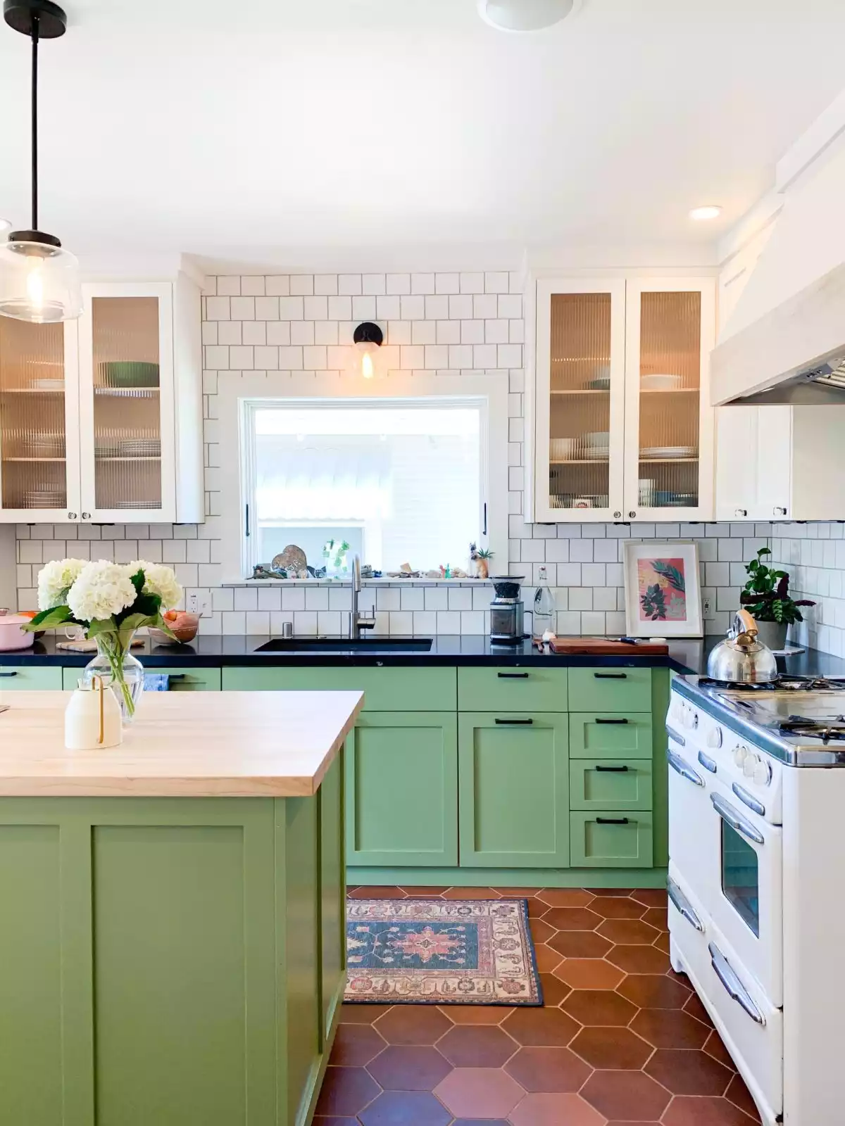 Terracotta Tile with Colored Cabinets