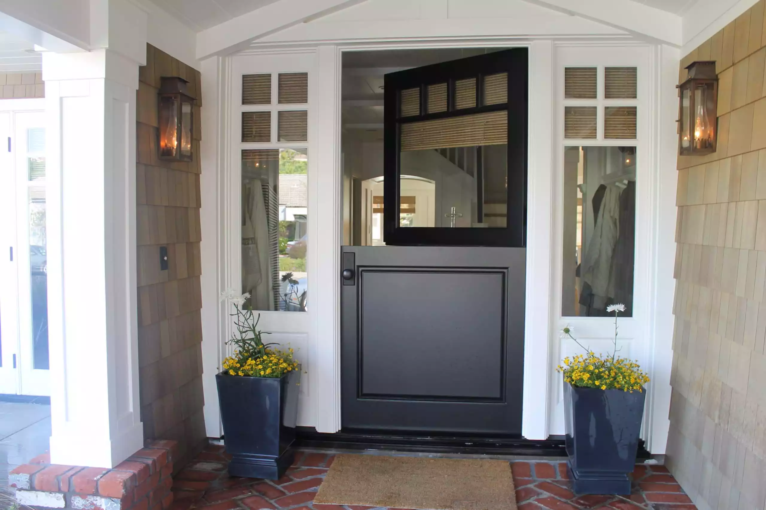 Traditional front porch black dutch door