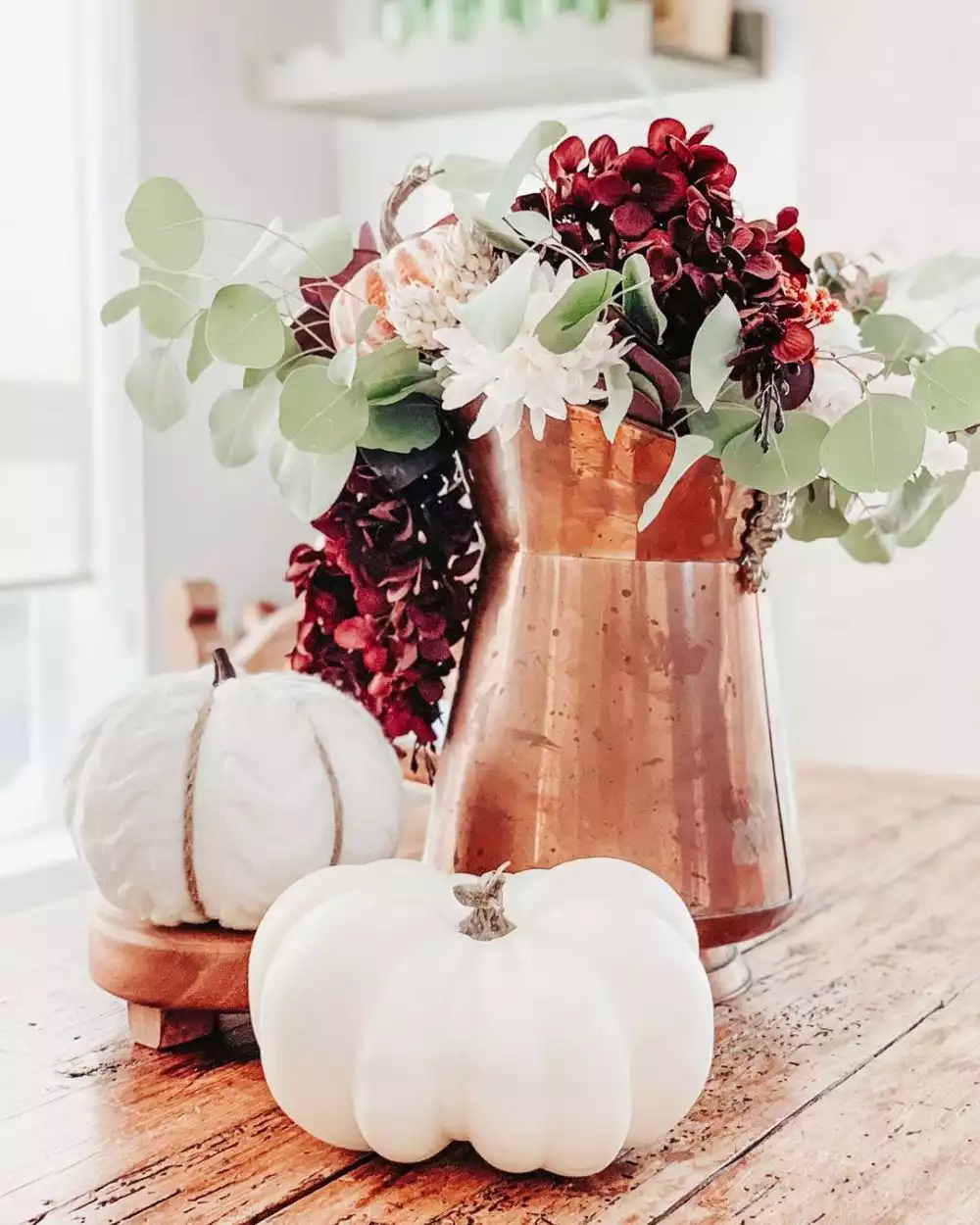 White Pumpkins with Seasonal Foliage