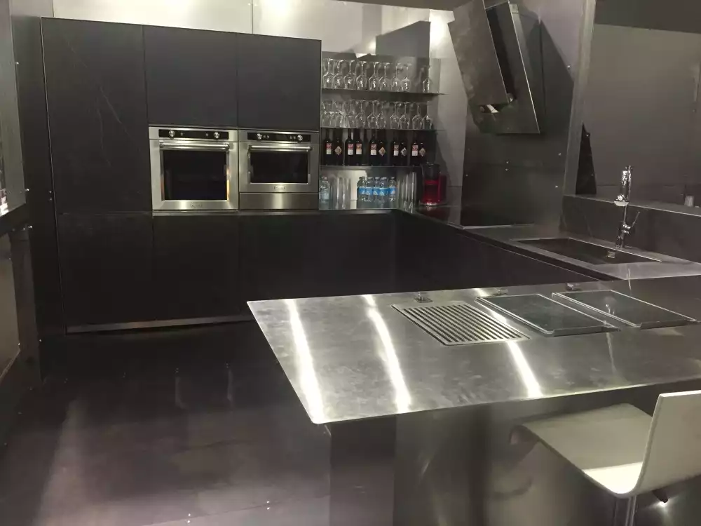 U shaped kitchen layout with stainless steel counter top