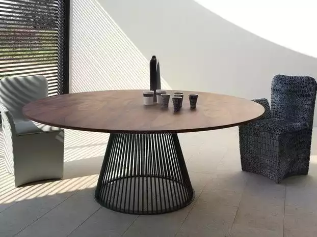 8 Modern Dining Tables With Round Tops and Stylish Bases