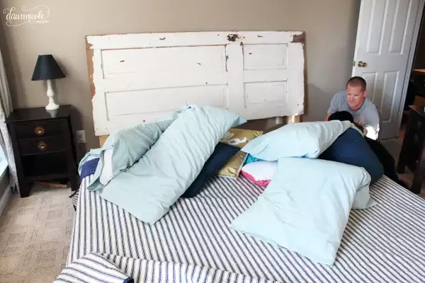 Vitange door turned into a headboard
