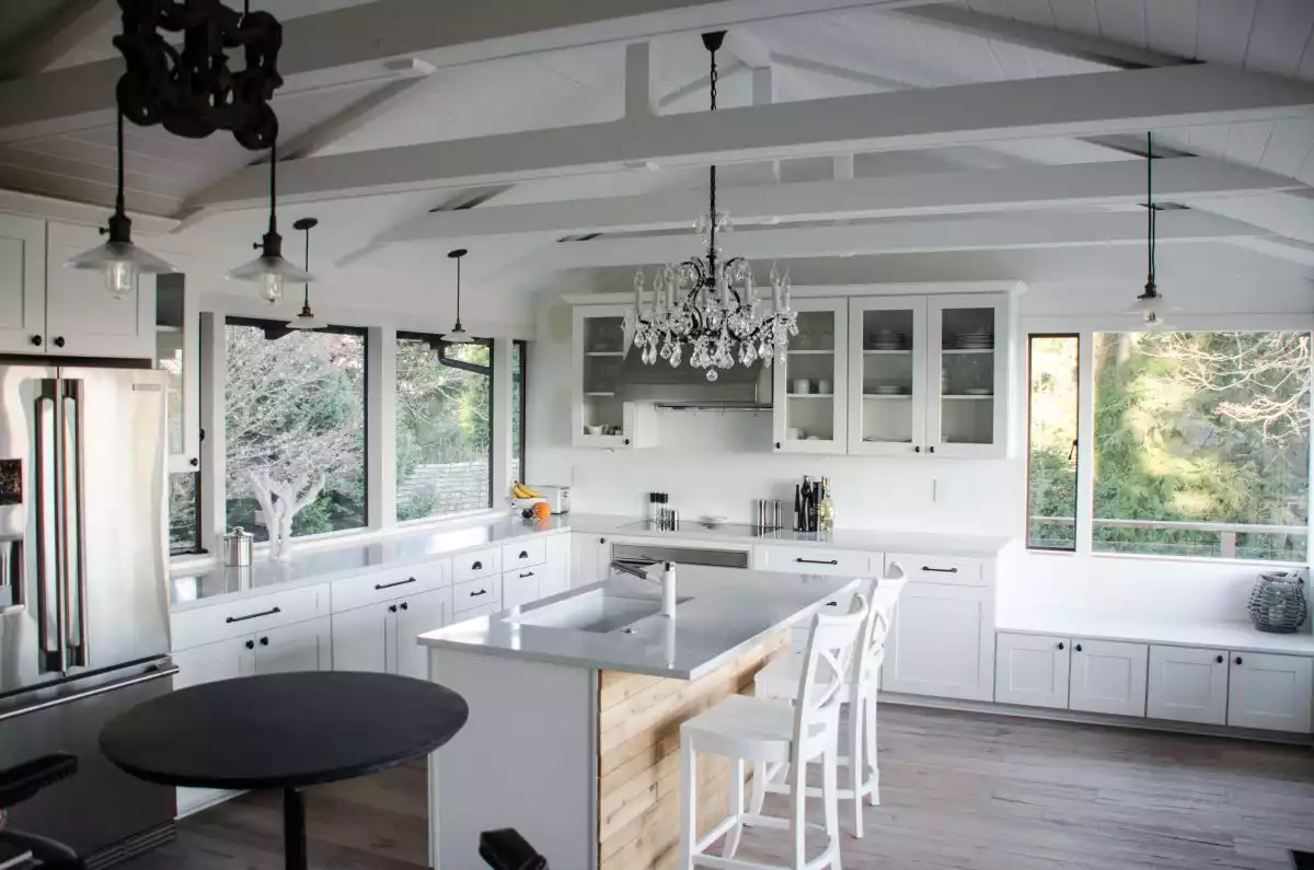 White kitchen with vaulted ceiling