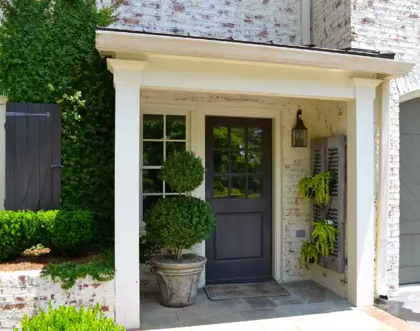 Window shutters and painted front door