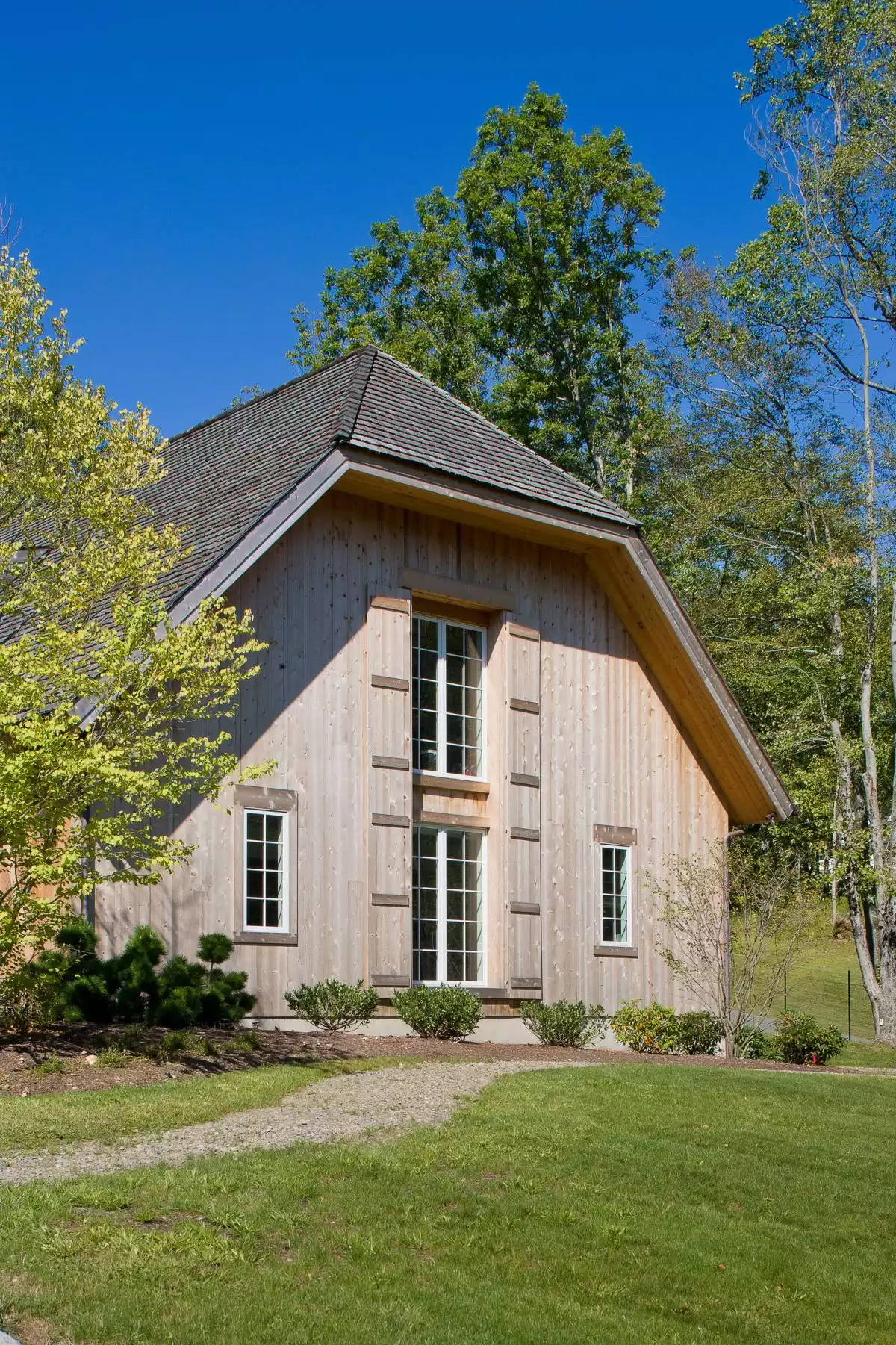 Wood Home with a Jerkinhead Roof