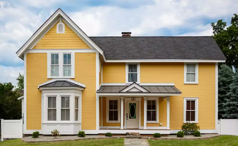 Yellow feng shui house exterior