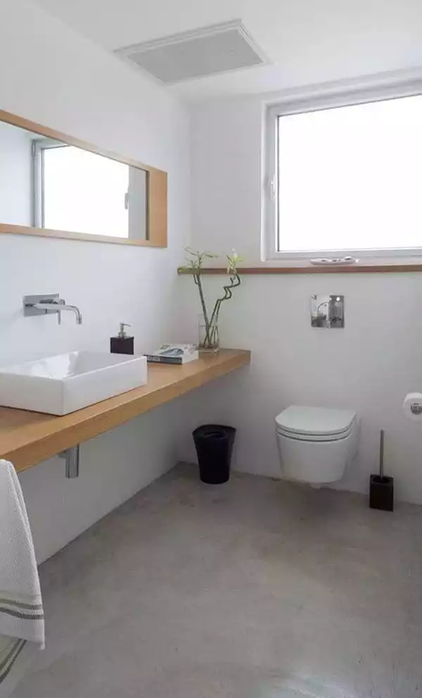 Bathroom with polished concrete floor