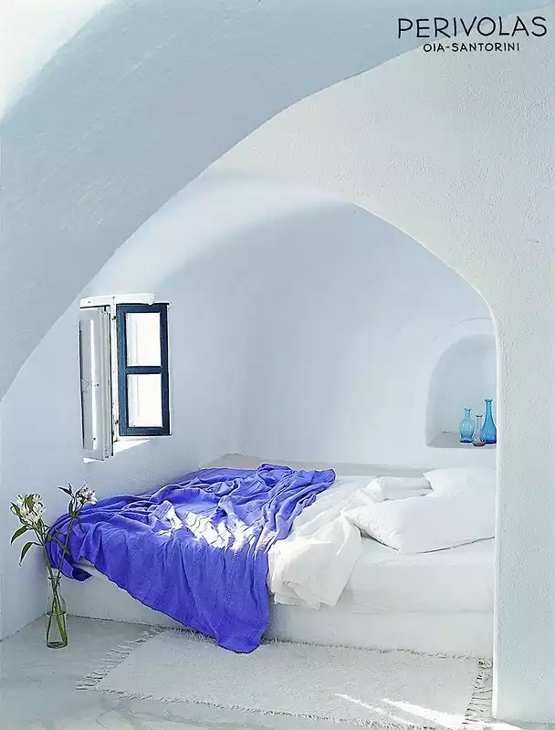 Blue accents for santorini bedroom
