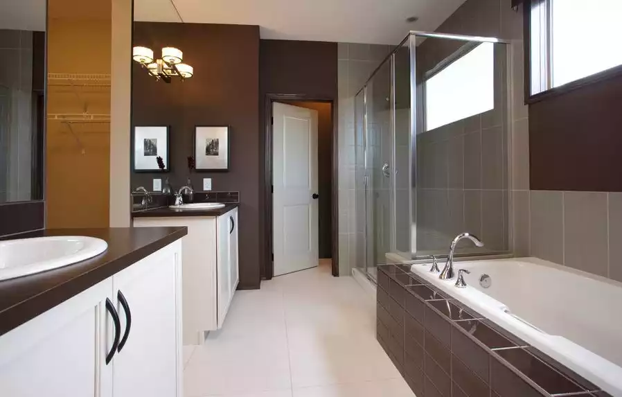 Brown bathroom accents from tiles to walls